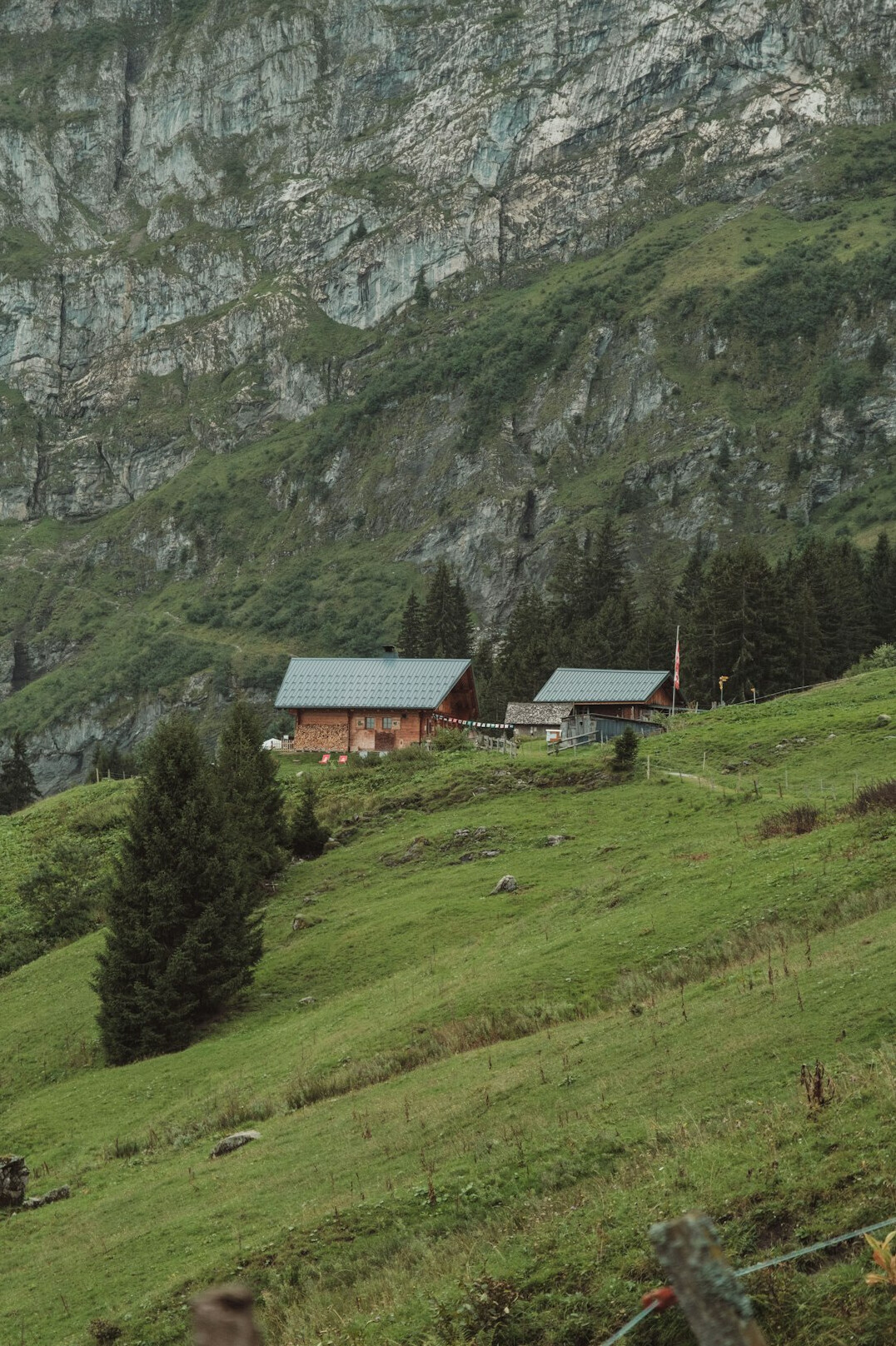 Traditional Swiss wooden chalet in an alpine mountain setting