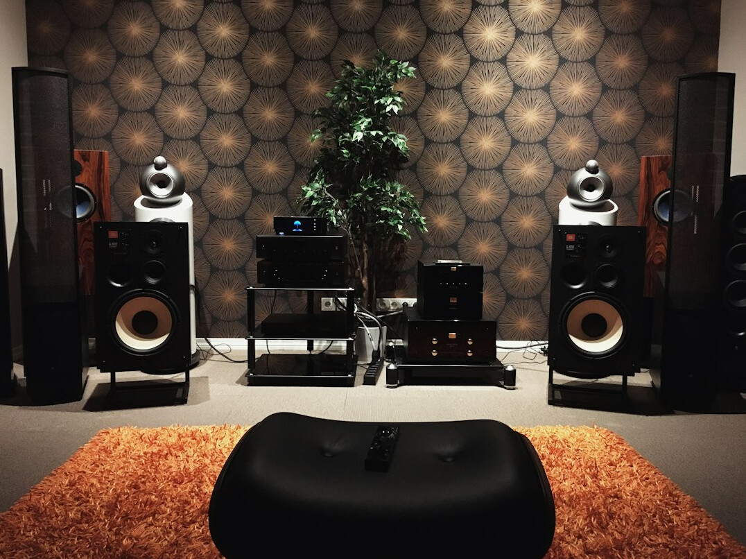 Home music recording studio with instruments and mixing desk